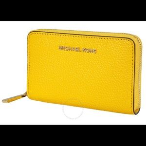 Michael Kors yellow zip up wallet